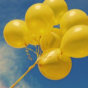 flying-neon-yellow-balloons-5juesq6j4c1pej6y